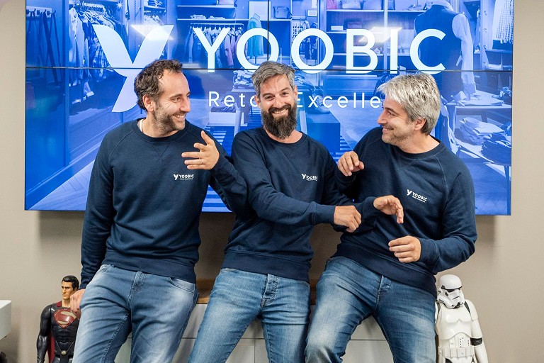 YOOBIC co-founders Fabrice, Gilles and Avi Haiat standing together